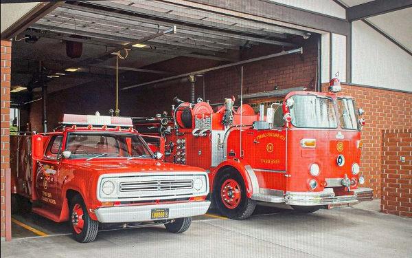 Crown Engine 51 and Squad 51 3/4 of the way inside the doors of Station 127 in Carson